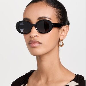 Krewe Alixe Sunglasses Oval Scalloped Frames in black with box